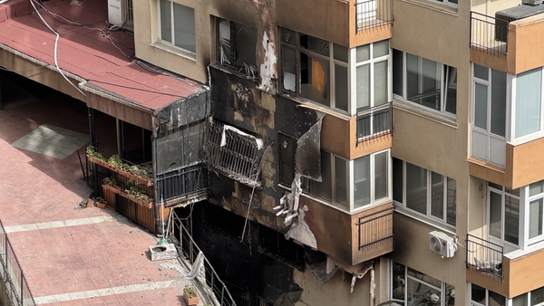 Fire brigades respond to the fire in the 13-storey building in Sisli district of Istanbul