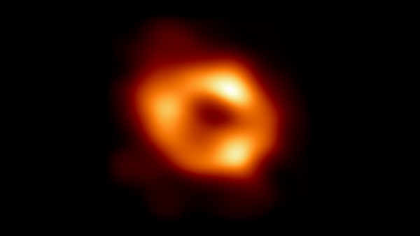 This is the first image of Sgr A*, the supermassive black hole at the centre of our galaxy, with an added black background to fit wider screens. It's the first direct visual evidence of the presence of this black hole. Photo: NASA/Getty Images