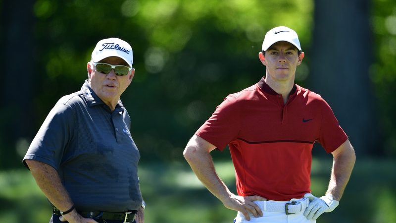 McIlroy with Butch Harmon during a practice round prior to the 2016 PGA Championship