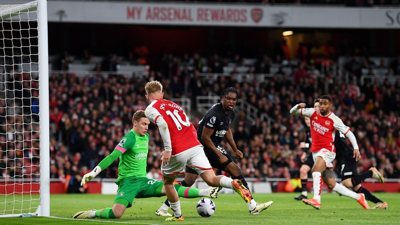 Emile Smith Rowe passes the ball to Reiss Nelson ahead of Arsenal's second goal, an own goal scored by Daiki Hashioka