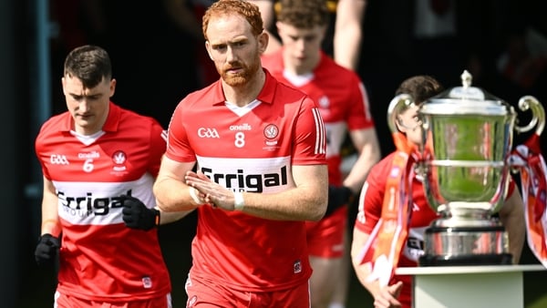 Derry captain Conor Glass glances at the Anglo Celt Cup before last year's provincial decider