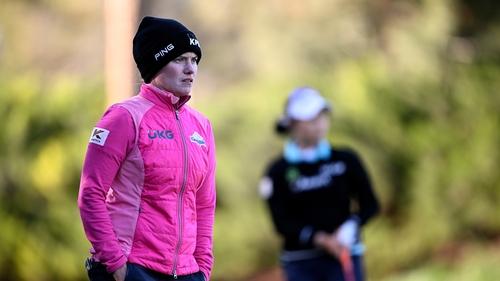Leona Maguire watches a Moriya Jutanugarn shot on the third hole