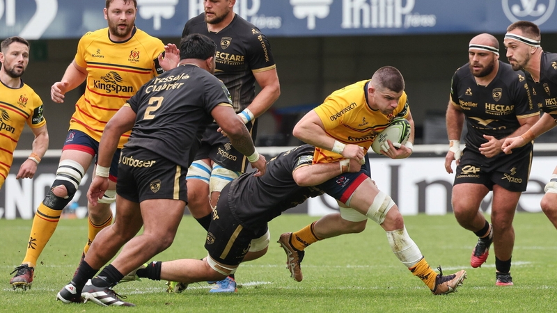 Nick Timoney of Ulster is tackled by Gregory Fichten of Montpellier