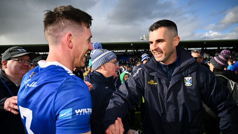 Raymond Galligan (r) celebrates with Killian Brady after Cavan's win over Monaghan