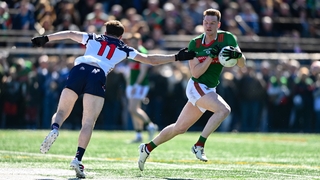 Matthew Ruane of Mayo in action against Frank O'Reilly of New York