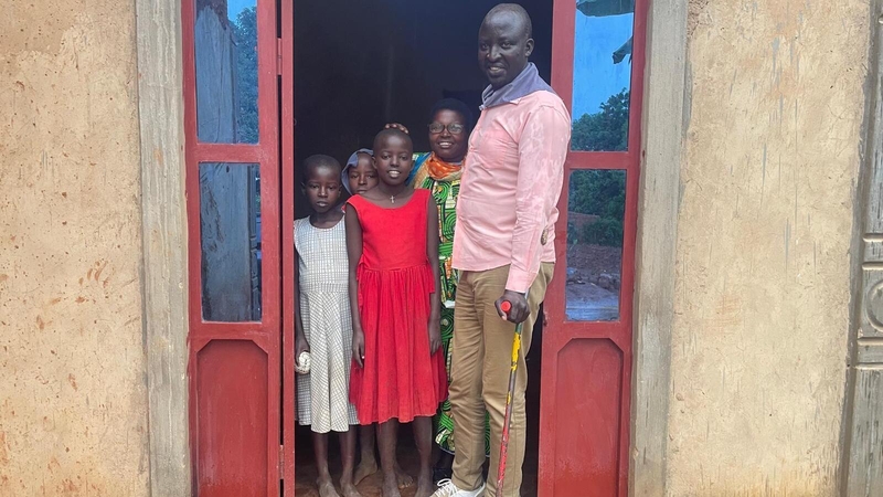John Giraneza with his wife and children