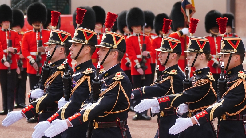 Members of France's Gendarmerie Garde Republicaine and members of the British Army's F Company Scots Guards take part in a special Changing of the Guard ceremony at Buckingham Palace