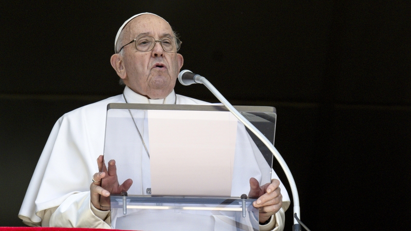 Pope Francis delivers his Angelus blessing from his studio overlooking St Peter's Square on 7 April