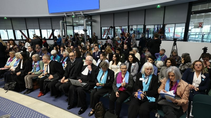 Representatives and lawyers of three climate change cases involving France, Portugal and Switzerland, pictured at the hearing of the European Court of Human Rights