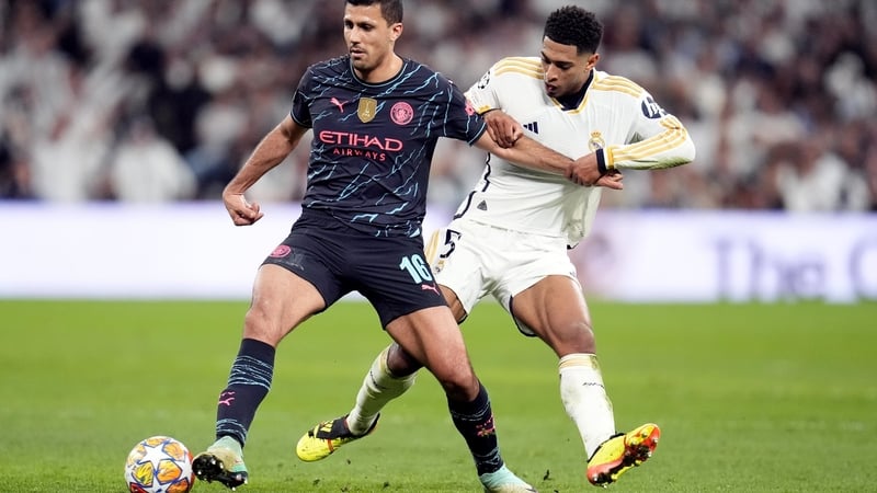 Jude Bellingham (R) and Real Madrid take on Manchester City on Wednesday night