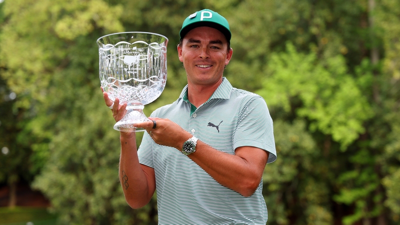 Rickie Fowler poses with Par Three trophy