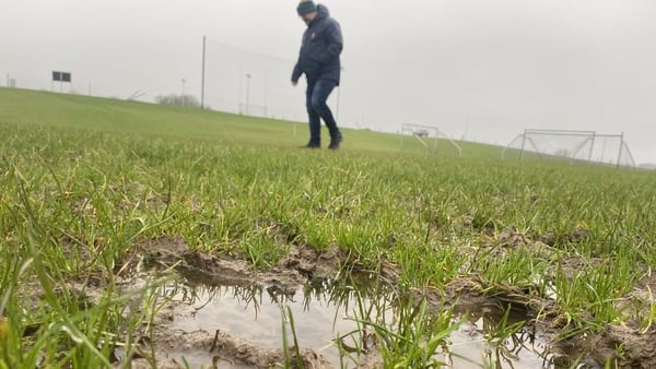 Cooley Kickhams GFC secretary Brian Rafferty walks on one of the club's waterlogged pitches