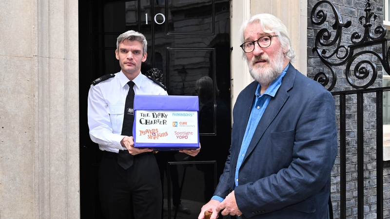 Jeremy Paxman marks World Parkinson's Day by handing in the 'Parky Charter' petition to Downing Street