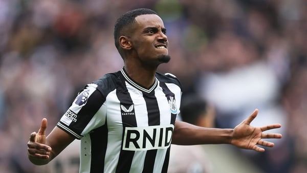Alexander Isak celebrates after scoring Newcastle's first goal