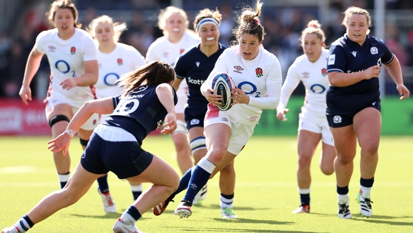 Jess Breach beats the tackle of Helen Nelson for England's second try