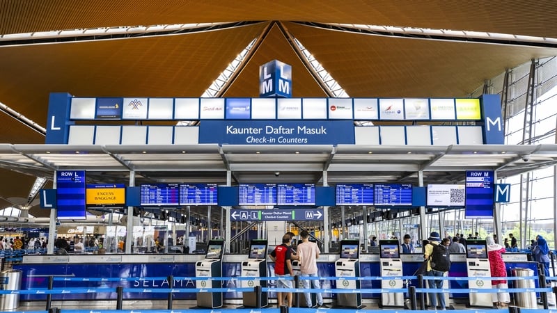 The shooter, who was thought to be targeting his wife in the arrivals hall, hit her bodyguard and then fled the scene