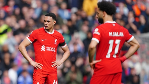 Liverpool's Trent Alexander-Arnold reacts to defeat