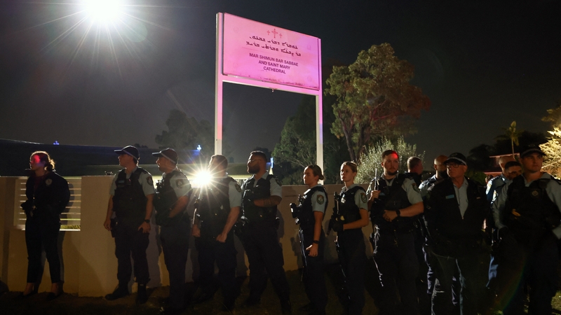 New South Wales police guard the perimeter of the Christ the Good Shepherd Church