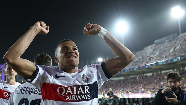 Kylian Mbappe celebrates after scoring PSG's third goal