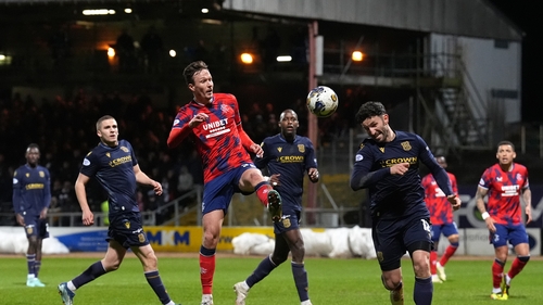 Rangers' Ben Davies and Dundee's Ricki Lamie battle for possession