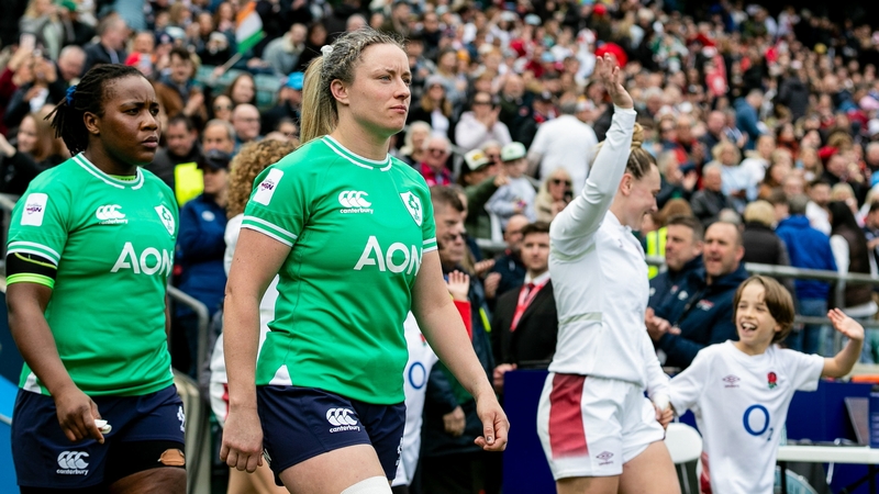 Edel McMahon (c) leads Ireland out at Twickenham