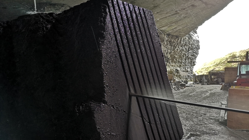 A quarry saw working on a piece of Valentia Slate in Co Kerry