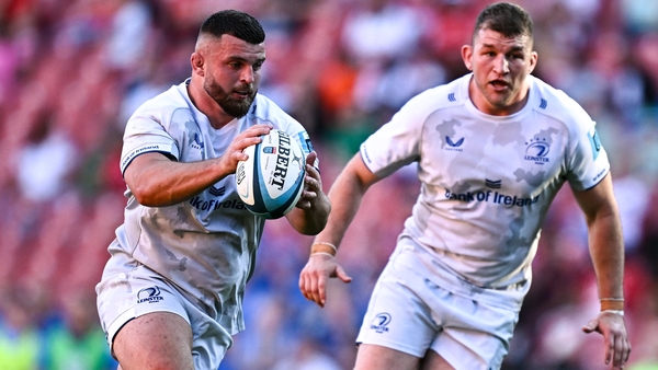 Michael Milne (l) in action against the Lions