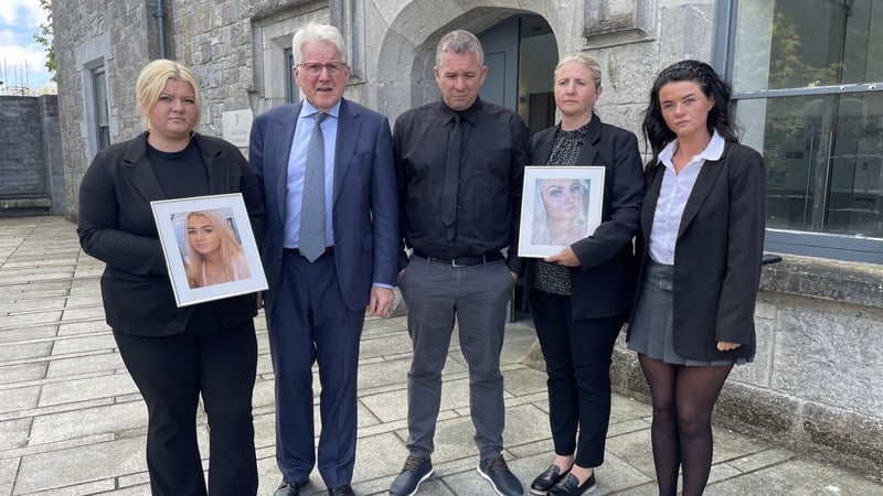 Aoife Johnston's family alongside solicitor Damien Tansey outside Kilmallock Courthouse at the inquest into her death
