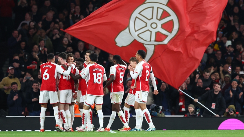 Arsenal players celebrate the fifth goal of the night, scored by Ben White