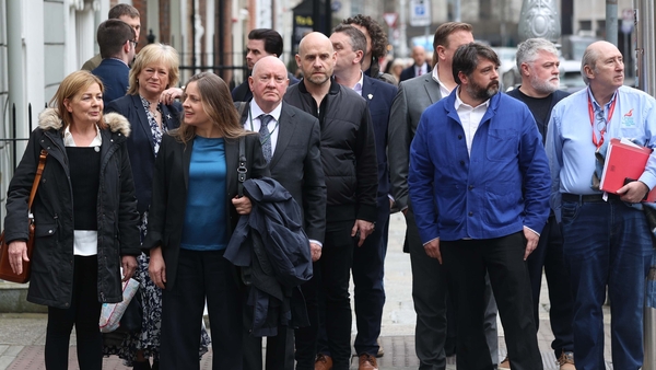 Representatives from unions including the NUJ, SIPTU, Connect and Unite are seen making their way into this afternoon's committee hearing