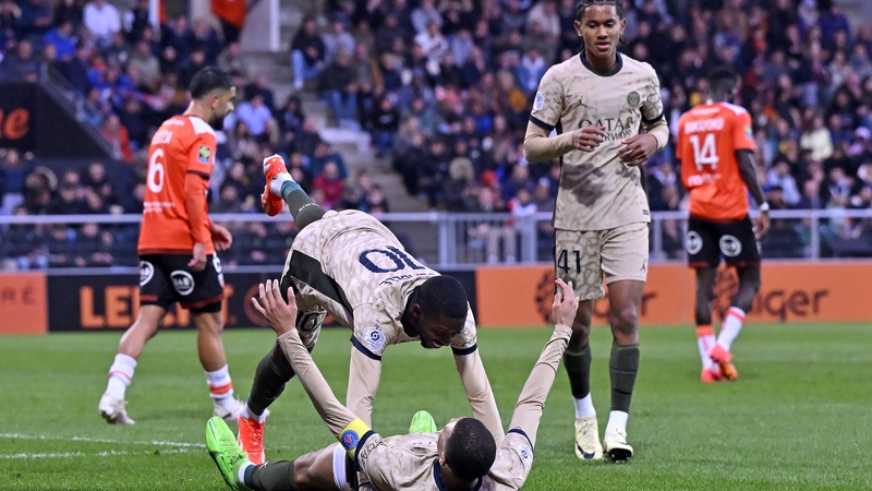 PSG's Ousmane Dembele (10) celebrates one of his goals with team-mate Kylian Mbappe