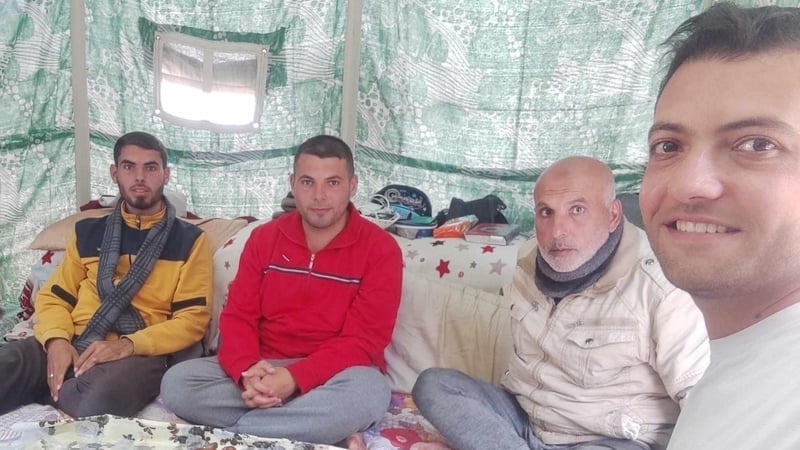 Khalid El-Astal's father Ali (second right) with sons Abdullah (far left) and Adbukrahman (second left) in Khan Younis
