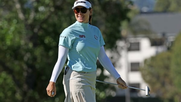 Hannah Green reacts after an eagle on the 13th green