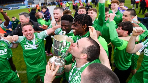 Glebe North captain Noel Barrett kisses the cup