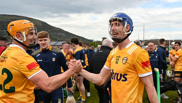 Michael Bradley and James McNaughton (r) celebrate after the final whistle at Corrigan Park