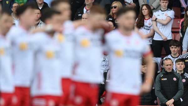 Tyrone joint-manager Brian Dooher and his players prior to the defeat to Donegal