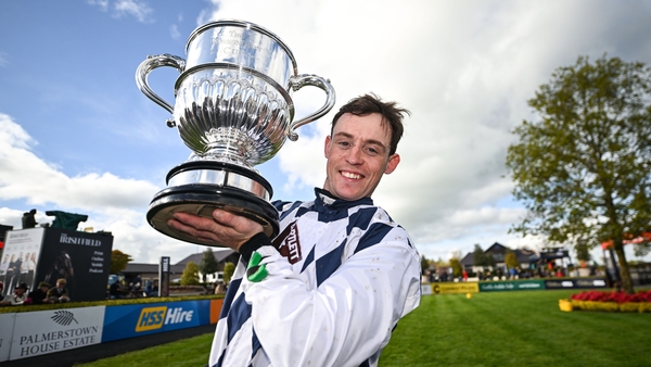 JJ Slevin celebrates after winning the William Hill Champion Chase aboard Banbridge