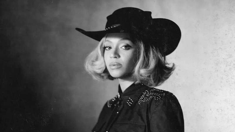 Cailín Bó Uí Chartúir, Beyoncé Ní Nualláin. Fíor, glic nó cur i gcéill?