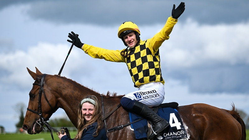 Paul Townend celebrates on Dancing City with groom Brid O'Keeffe after winning the Channor Real Estate Group Novice Hurdle
