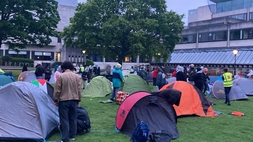 Around 15 tents have been pitched on the grass