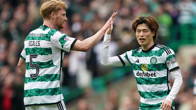 Celtic's Kyogo Furuhashi celebrates scoring with team-mate Liam Scales