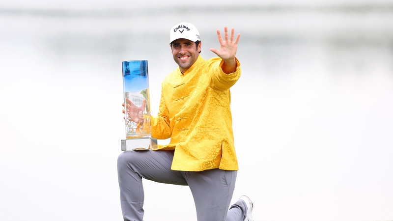 Adrian Otaegui celebrates with the Volvo China Open trophy