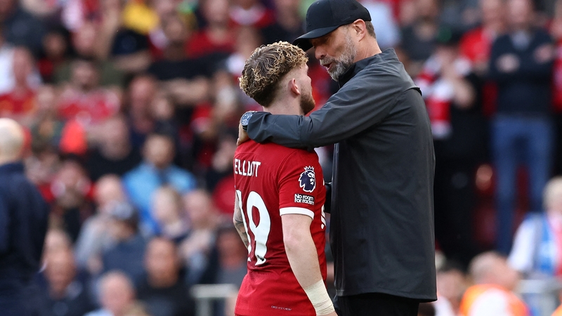 Jurgen Klopp (L) speaks to goalscorer Harvey Elliott after Liverpool's win