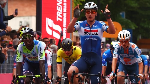 Tim Merlier celebrates his stage victory