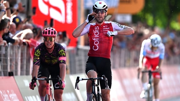 Benjamin Thomas celebrates as he crosses the line to win stage five