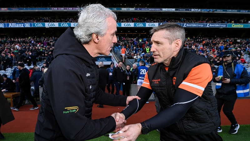 Donegal boss Jim McGuinness (L) and Armagh manager Kieran McGeeney go head-to-head this afternoon