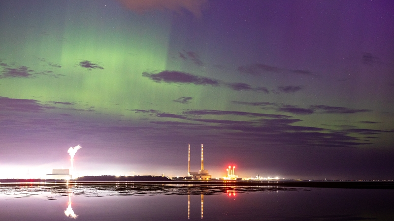 The Northern Lights as seen over Poolbeg in Dublin after the recent solar storm
