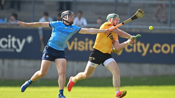 Dónal Burke of Dublin and Niall McKenna of Antrim do battle at Parnell Park