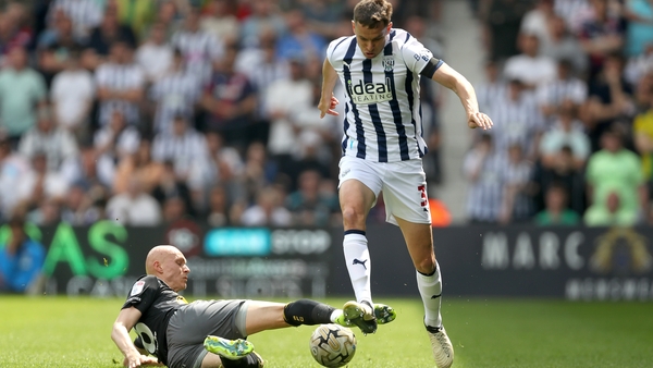 Southampton and Ireland midfielder Will Smallbone tackles Conor Townsend