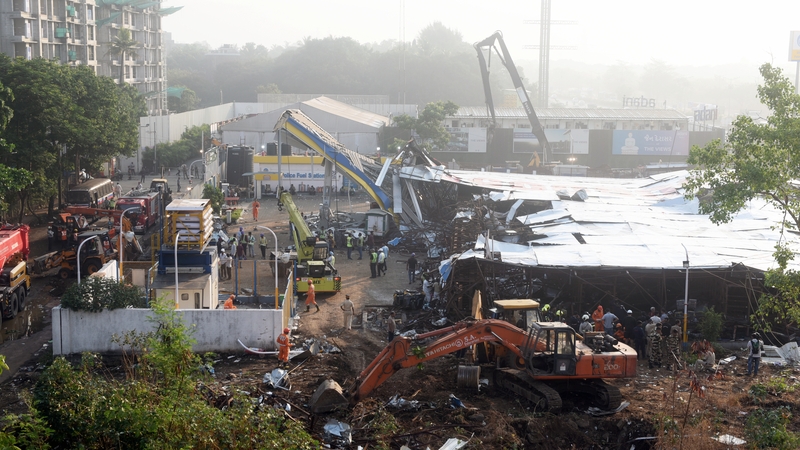 The giant billboard collapsed during a thunderstorm